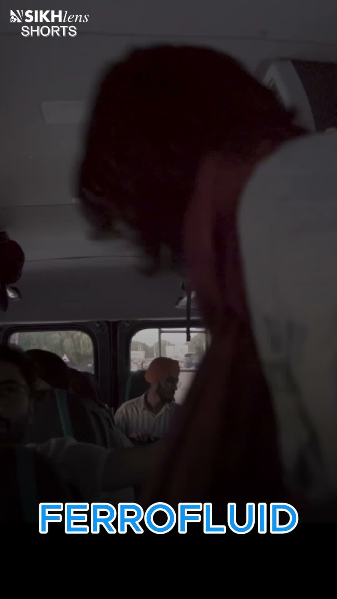 A folk duet in the back of a moving bus, tractors going past the...